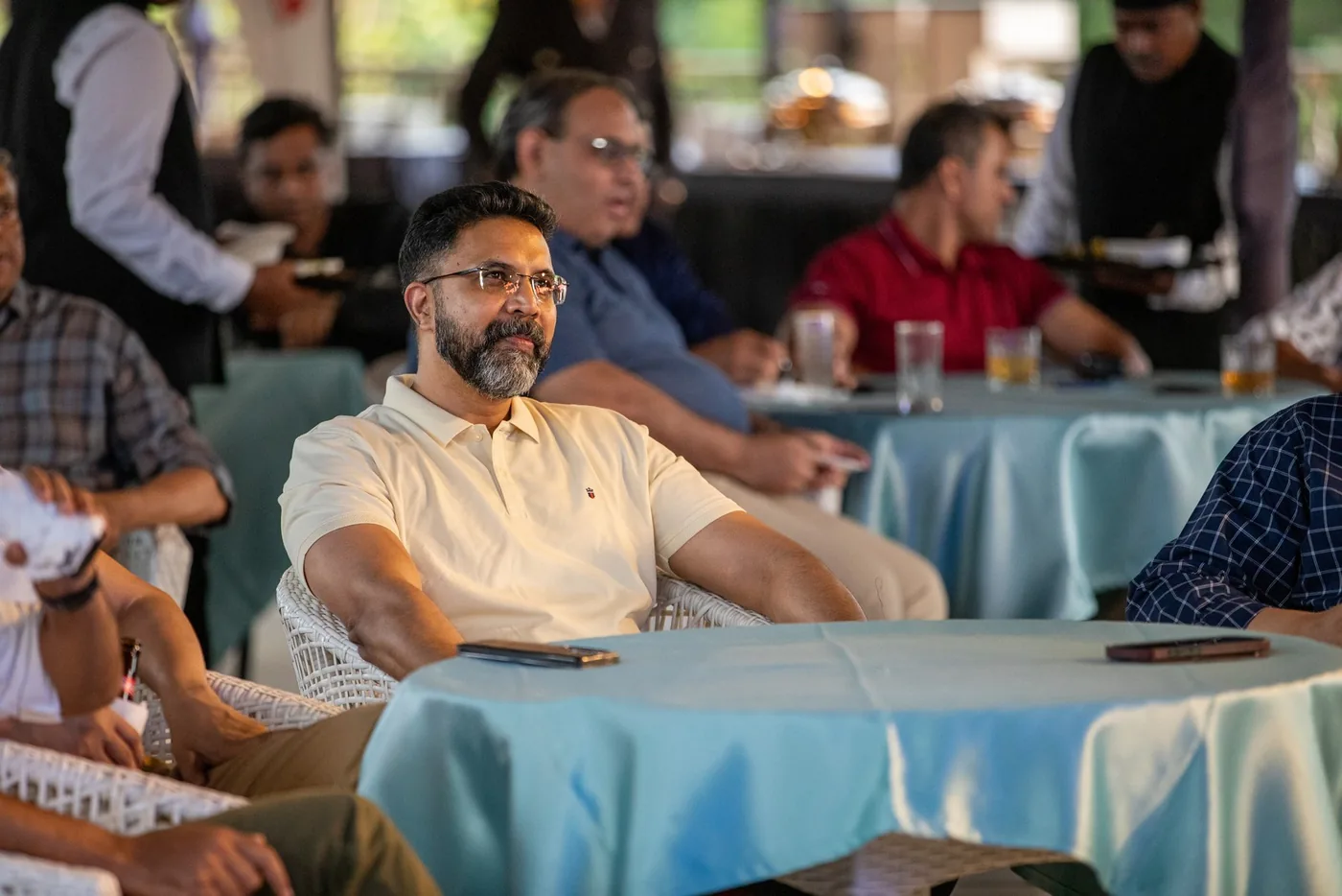 Guests listening during an informal GCC Mixer discussion