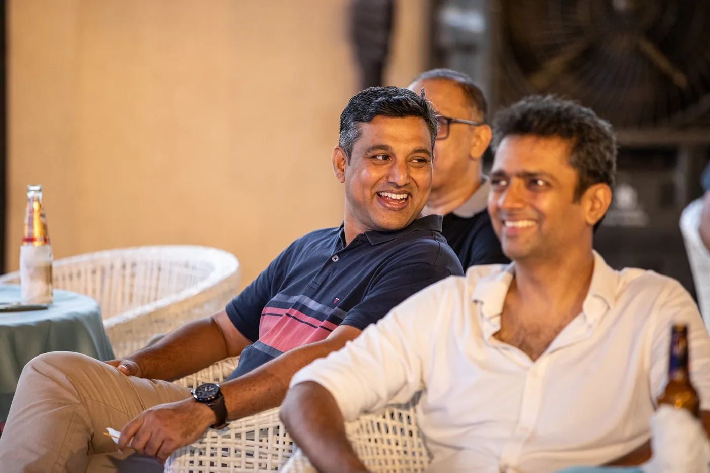 Two attendees smiling during wine and dine networking