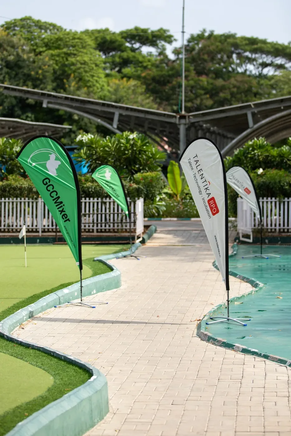 GCC Mixer flags lining the arrival route at Yerawada Golf Club
